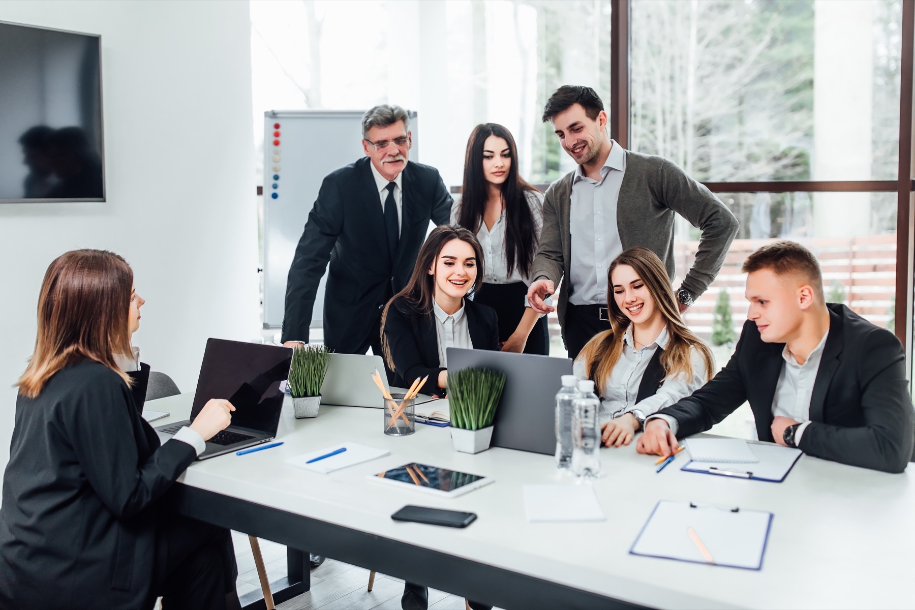 The ASquare team collaborating in the office